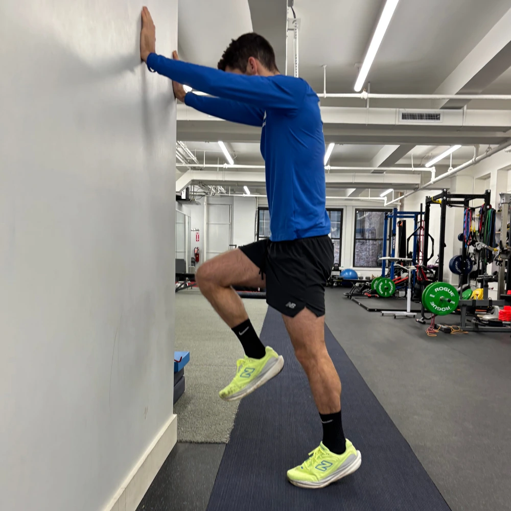 Heel Raises Against Wall